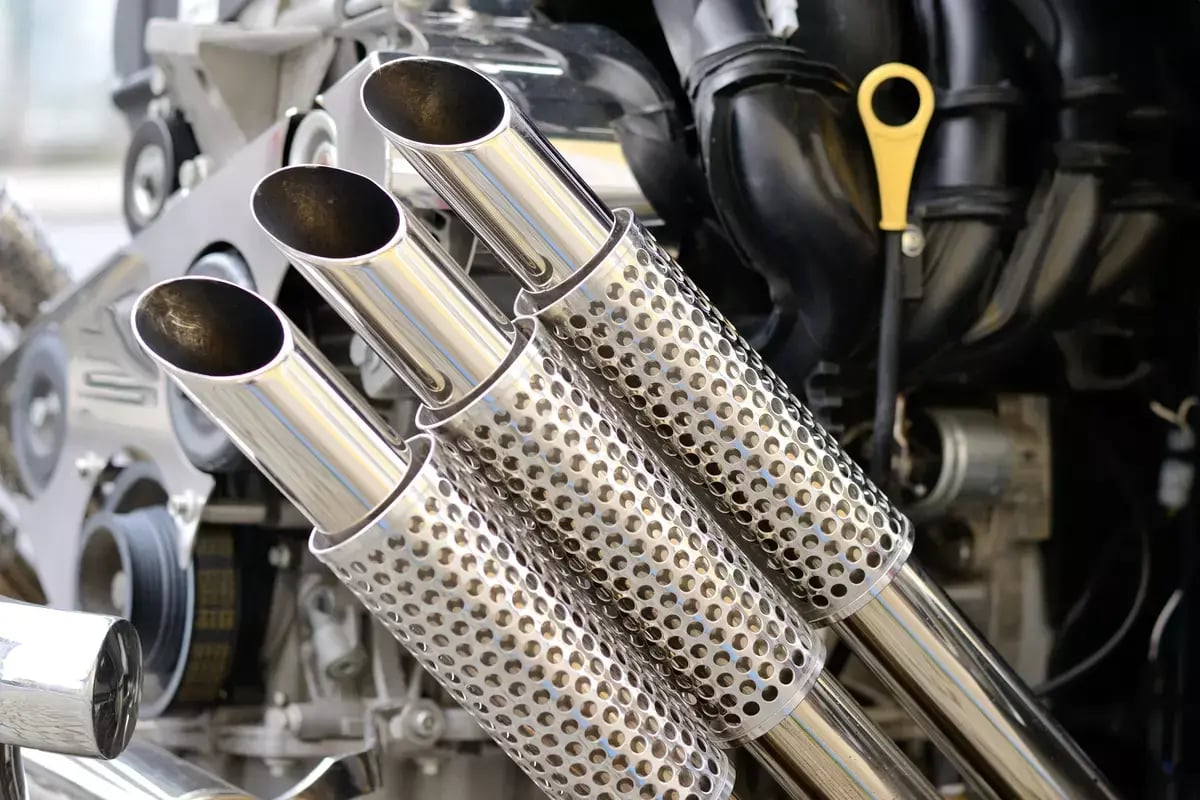 Close-up of an exhaust trio of a trike