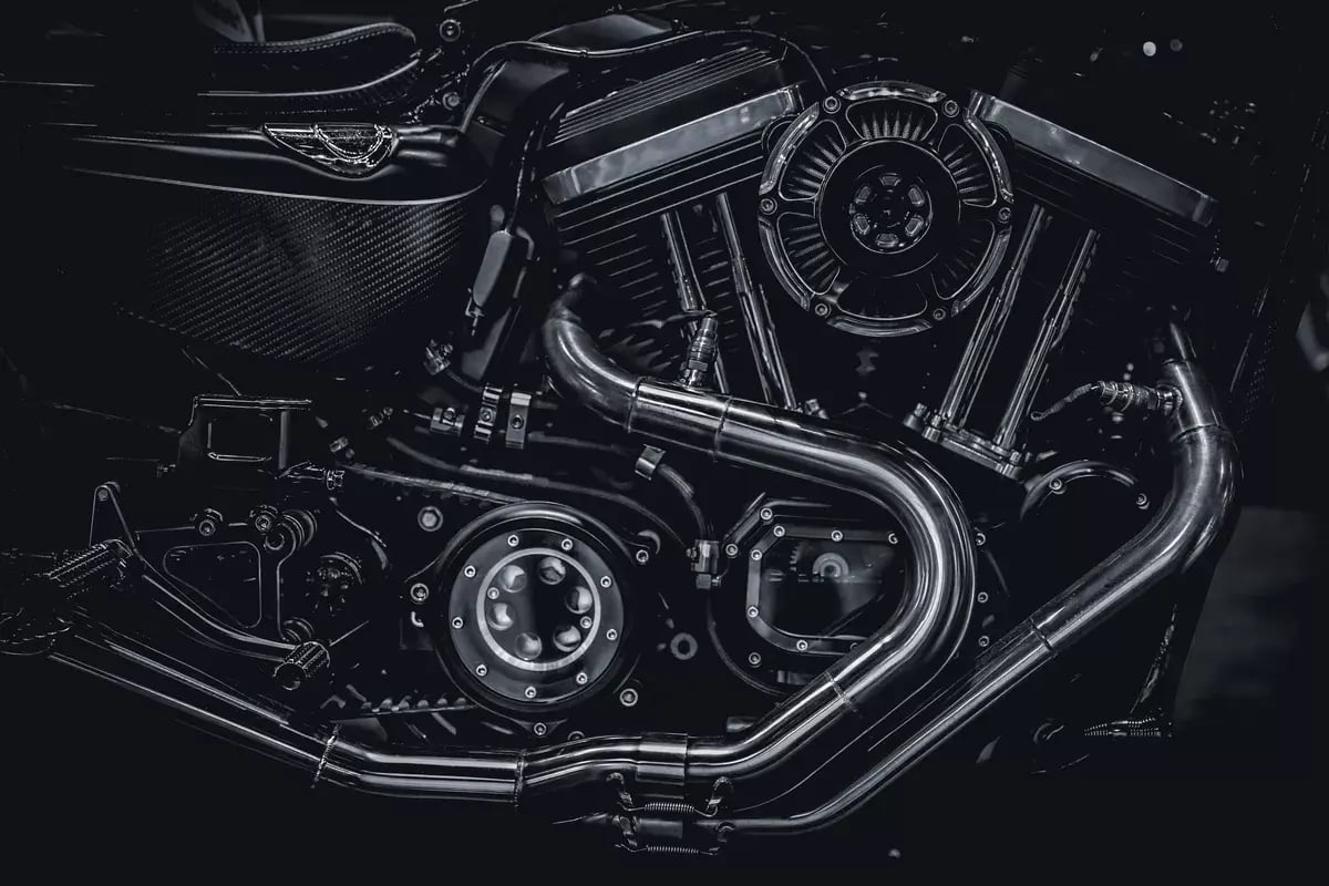Motorcycle engine exhaust pipes art photography in black and white vintage tone