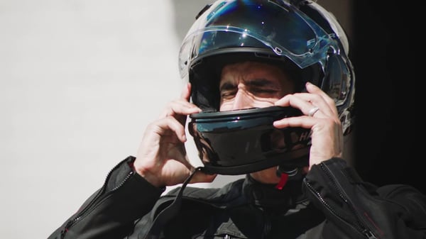 man wearing a harley davidson full face helmet